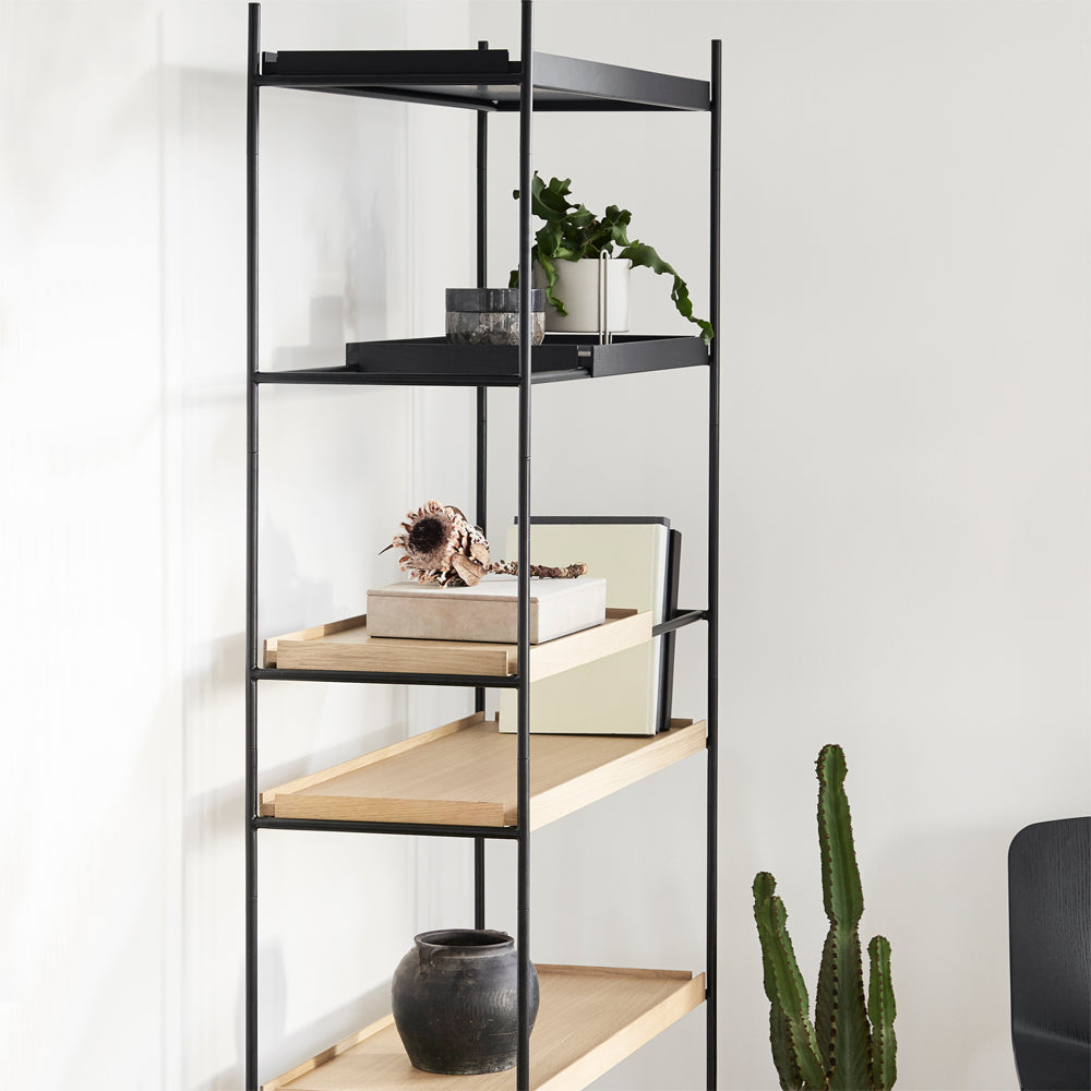 Tray Shelf by Woud, showing side view of tray shelf in live shot.