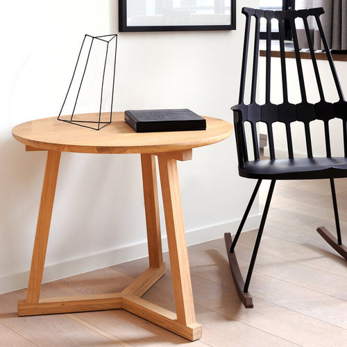 Tripod Side Table by Ethnicraft, showing tripod side table in live shot.
