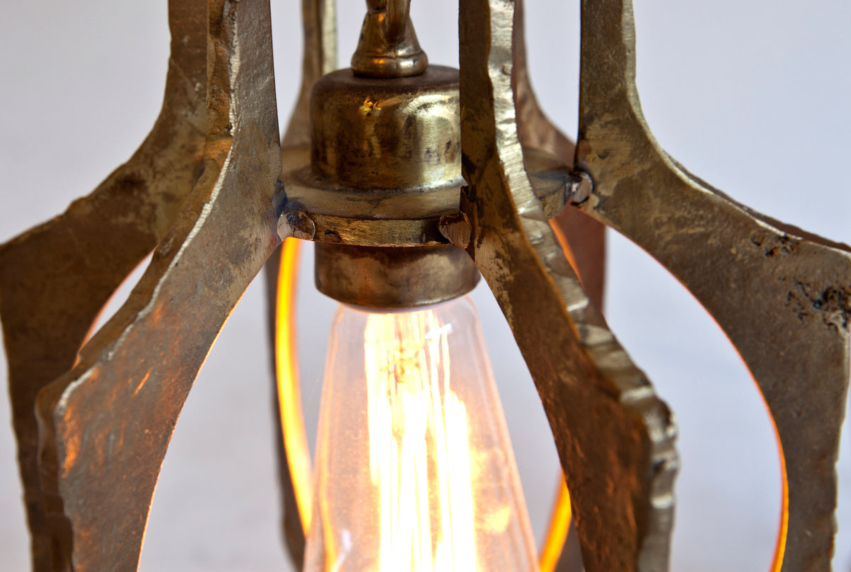 James De Wulf Triton Pendant by De Wulf, showing triton pendant in live shot.