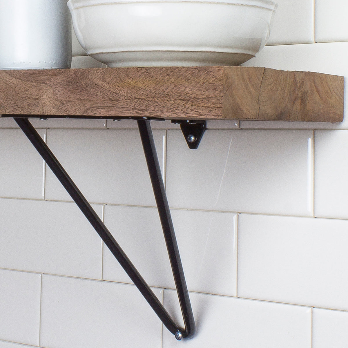 Adams Shelf Brackets by Tronk Design, showing closeup view of adams shelf brackets in live shot.