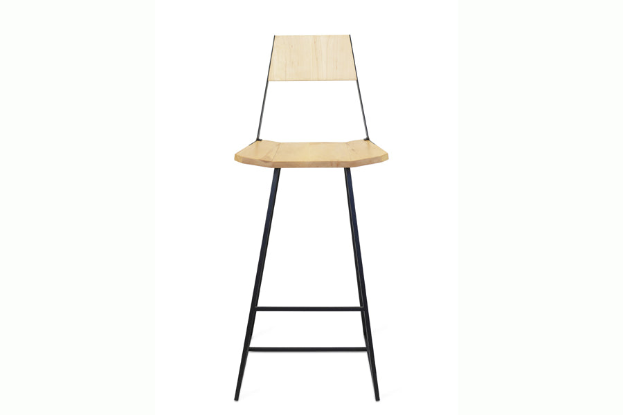 Clarkester Stool by Tronk Design, showing front view of clarkester stool in maple wood, black powder coated steel.