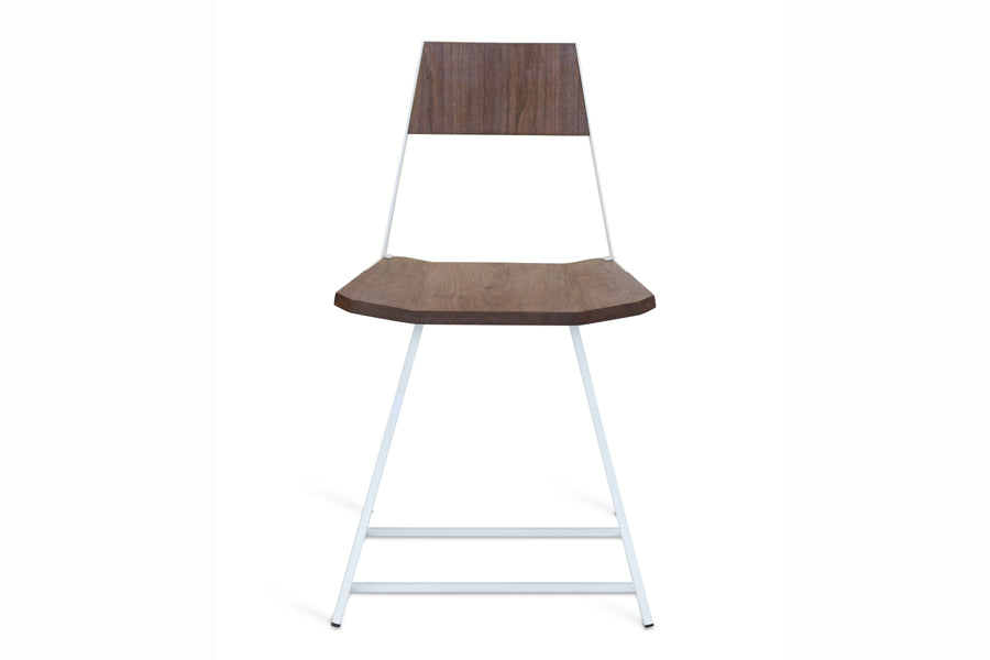Clarkester Chair by Tronk Design, showing front view of clarkester chair in walnut wood, white powder coated steel.