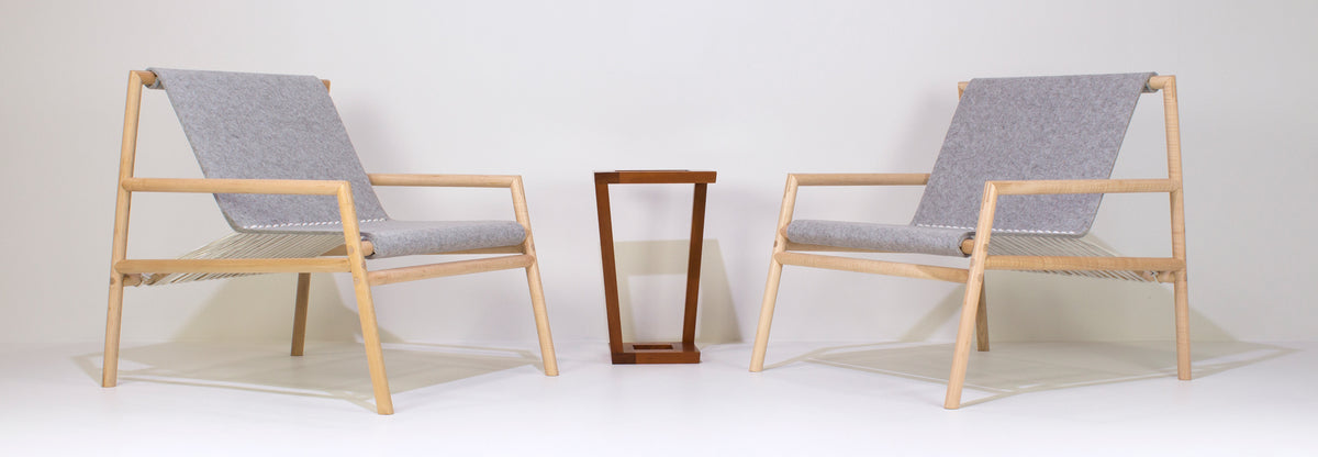 Gallagher Lounge Chair by Tronk Design, showing gallagher lounge chairs in live shot.