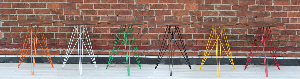 Hudson Side Table by Tronk Design, showing group of hudson side table in live shot.