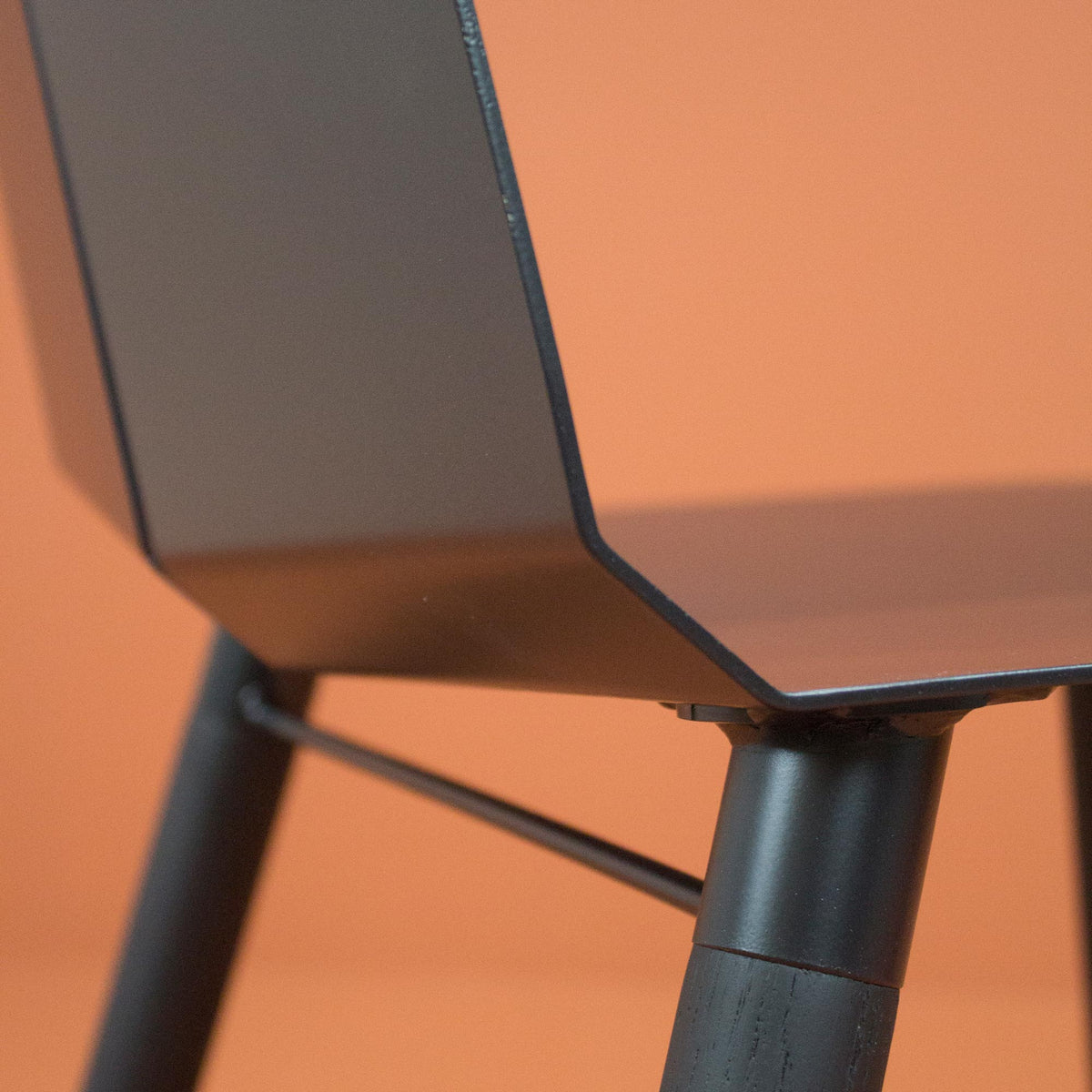 Noa Chair by Tronk Design, showing closeup view of noa chair in live shot.