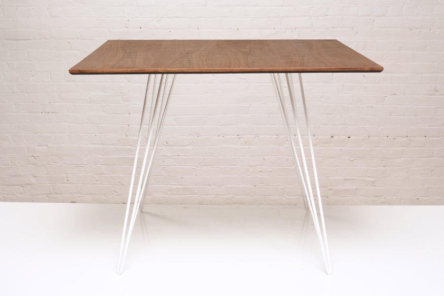 Williams Square Dining Table by Tronk Design, showing williams square dining table in live shot.