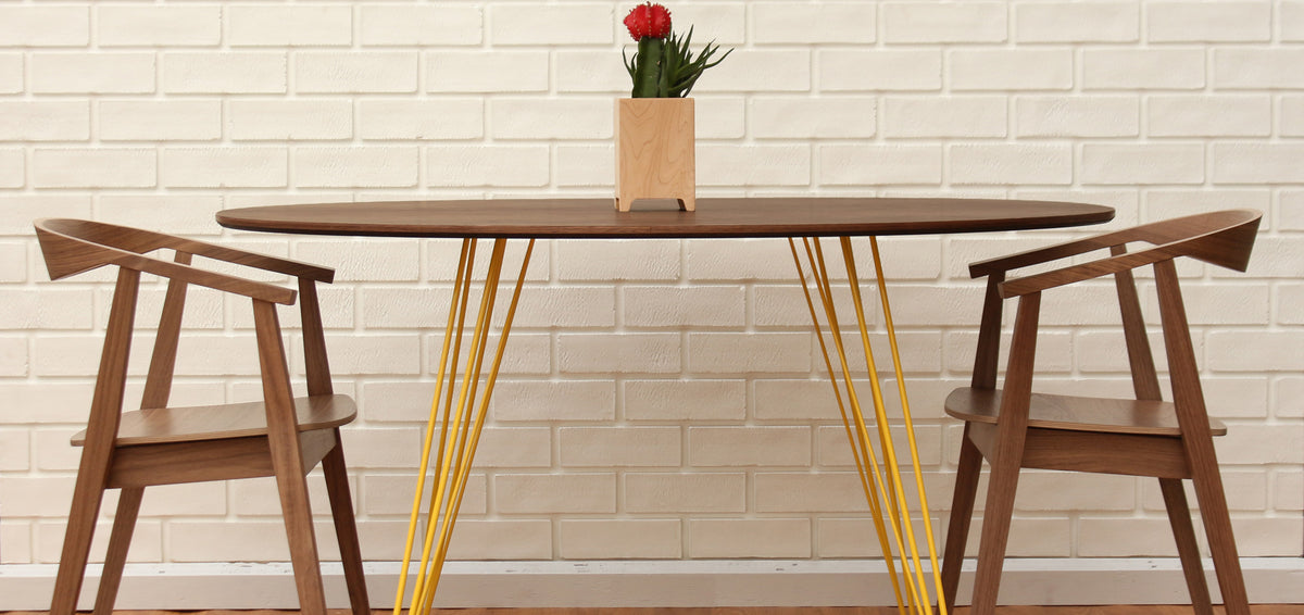 Williams Round Dining Table by Tronk Design, showing williams round dining table in live shot.