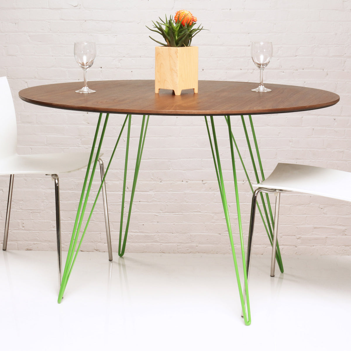 Williams Round Dining Table by Tronk Design, showing williams round dining table in live shot.