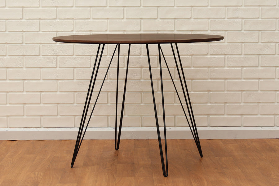 Williams Round Dining Table by Tronk Design, showing williams round dining table in live shot.