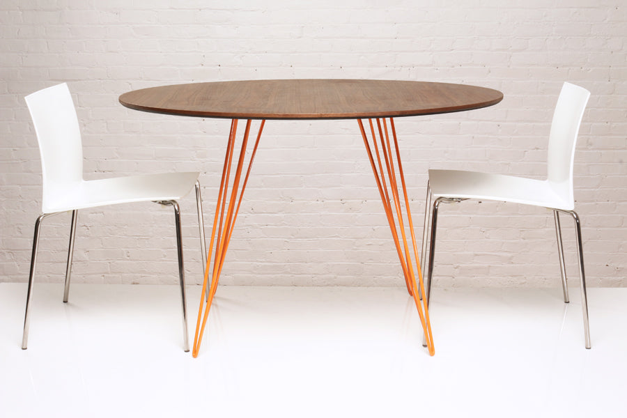 Williams Round Dining Table by Tronk Design, showing williams round dining table in live shot.