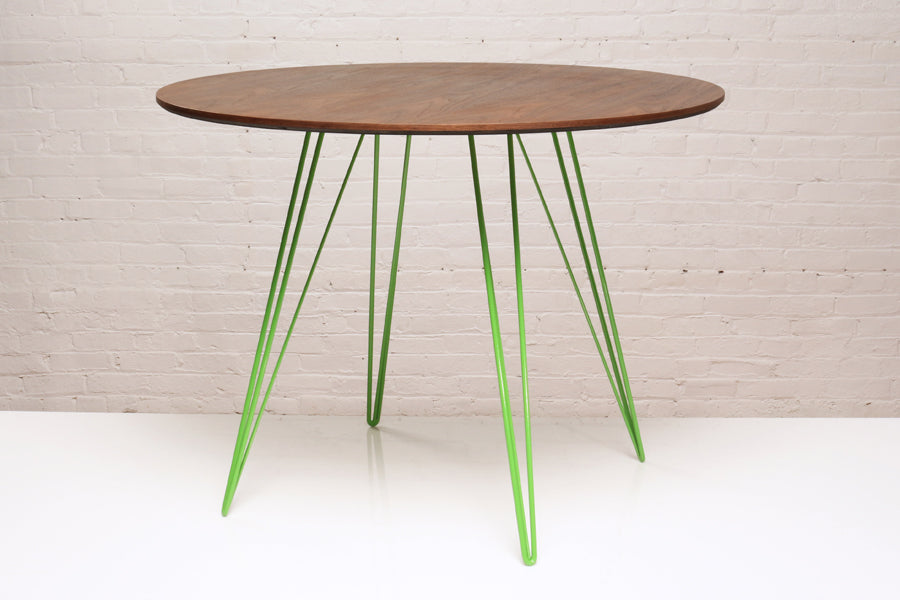 Williams Round Dining Table by Tronk Design, showing williams round dining table in live shot.