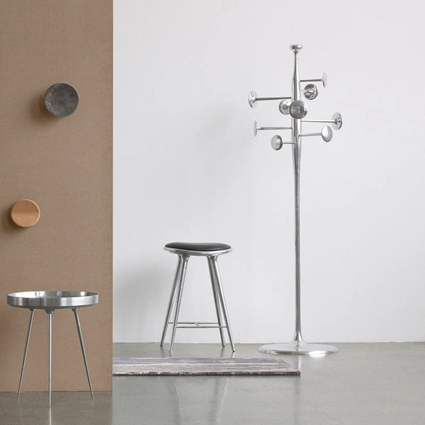 Trumpet Coat Stand by Mater, showing trumpet coat stand in live shot.