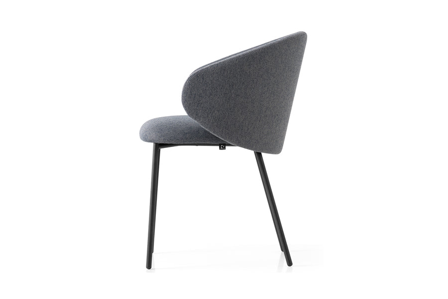 Tuka Metal Legs Armchair by Connubia, showing side view of tuka metal legs armchair in matt black metal frame + black cros upholstery.