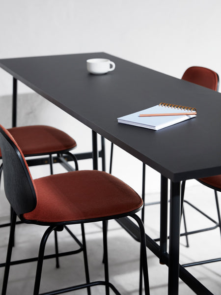 Union Bar Table by Normann Copenhagen, showing closeup view of union bar table in live shot.