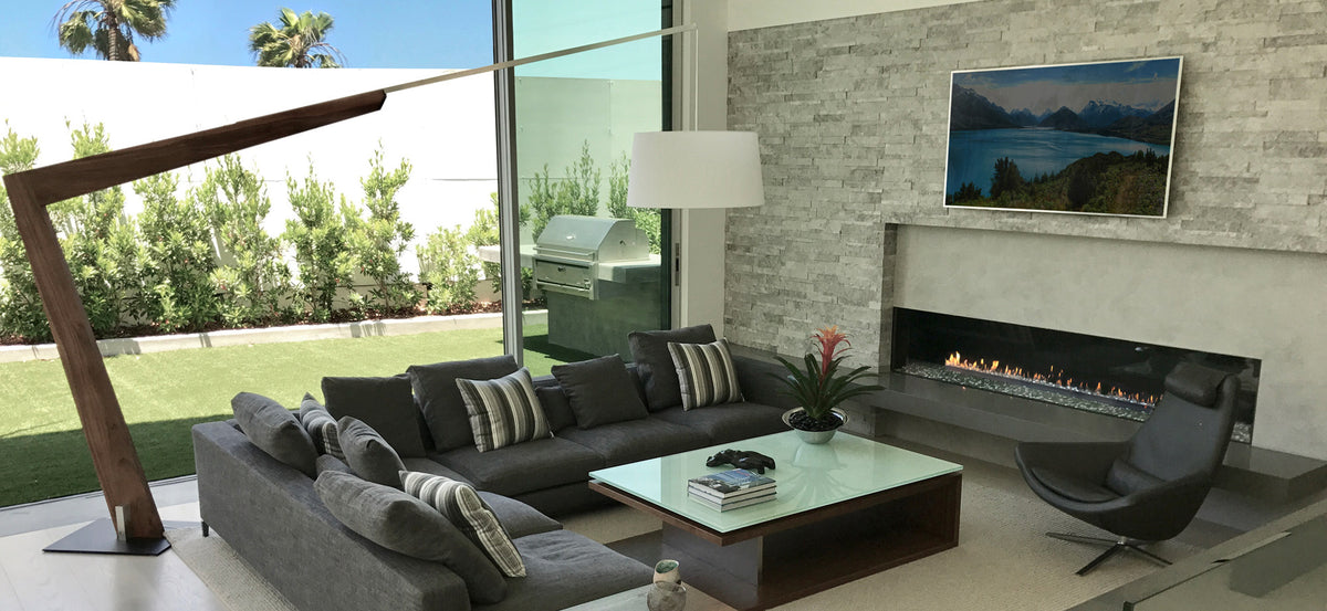 Valeo Floor Lamp by Cerno, showing valeo floor lamp with sectional, table & chair in live shot.