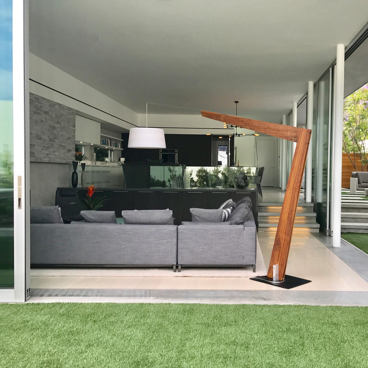 Valeo Floor Lamp by Cerno, showing valeo floor lamp with sectional in live shot.