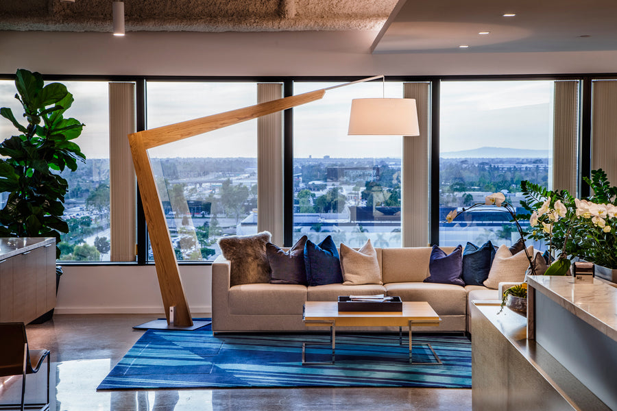 Valeo Floor Lamp by Cerno, showing valeo floor lamp with sofa, table & chair in live shot.