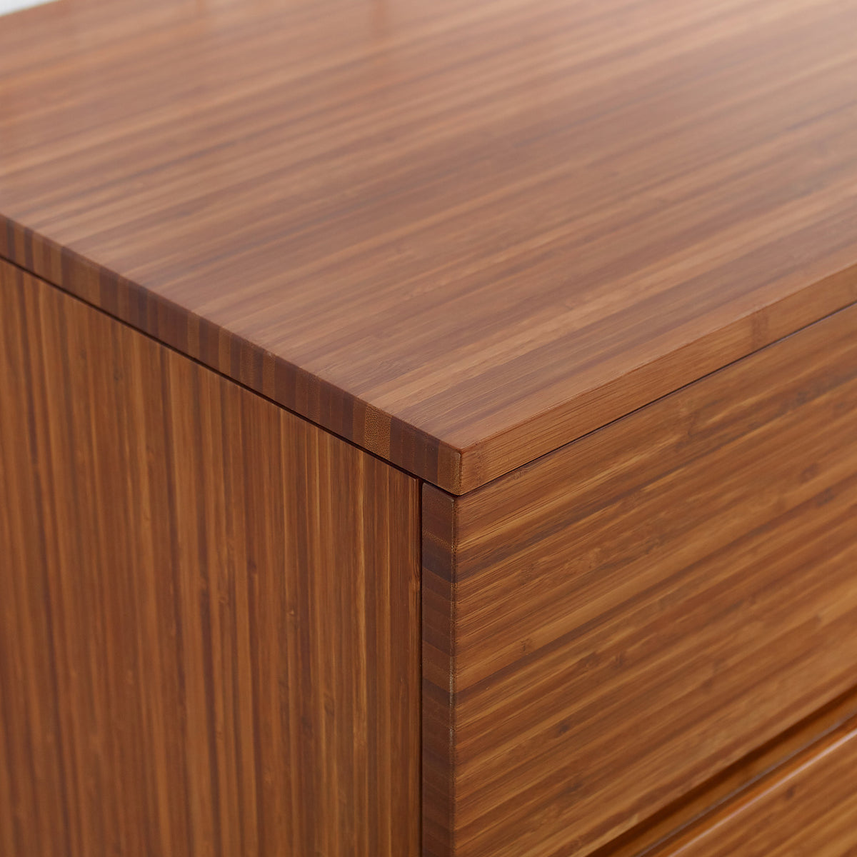 Ventura Amber 4 Drawer Double Dresser by Greenington, showing closeup view of ventura amber 4 drawer double dresser in live shot.