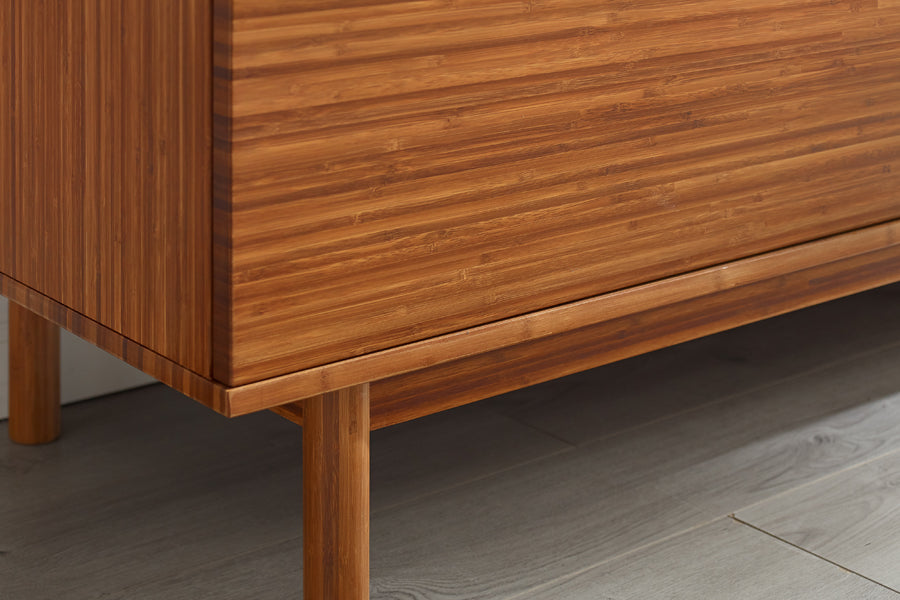 Ventura Amber 4 Drawer Double Dresser by Greenington, showing closeup view of ventura amber 4 drawer double dresser in live shot.