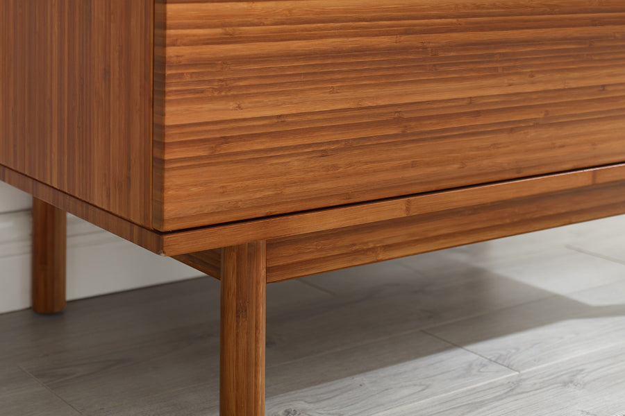 Ventura Amber 4 Drawer High Chest by Greenington, showing closeup view of ventura amber 4 drawer high chest in live shot.