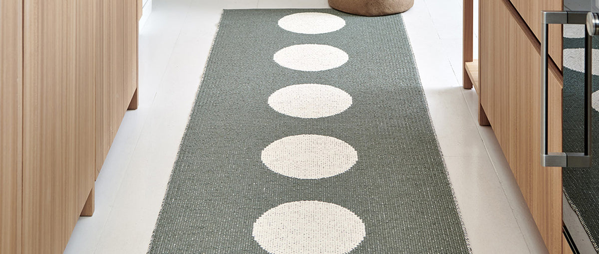 Vera Army & Vanilla Runner Rug by Pappelina, showing of vera army & vanilla runner rug in live shot.