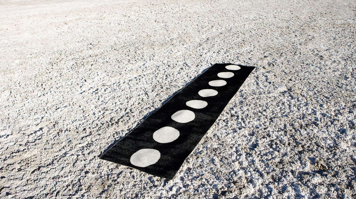 Vera Black & Vanilla Runner Rug by Pappelina, showing vera black & vanilla runner rug in live shot.