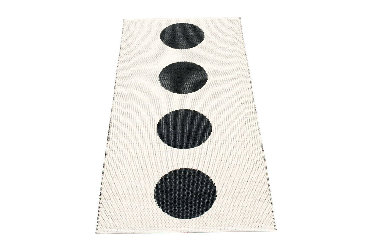 Vera Black & Vanilla Runner Rug by Pappelina, showing back view of vera black & vanilla runner rug.