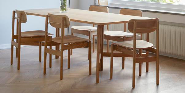 Vester Dining Chair by Skagerak, showing vester dining chairs in live shot.