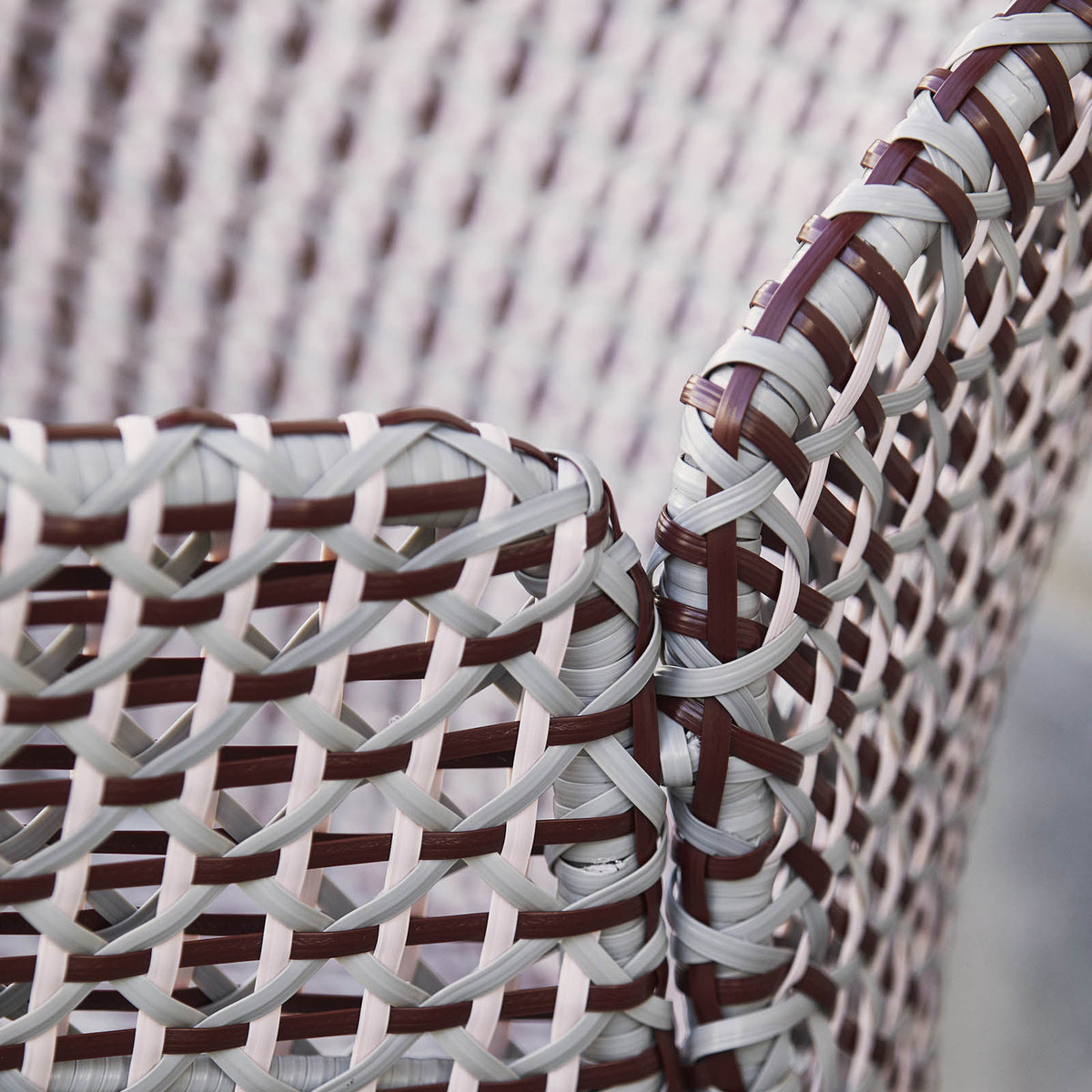 Vibe Outdoor Lounge Chair by Cane-Line, showing closeup view of vibe outdoor lounge chair in live shot.