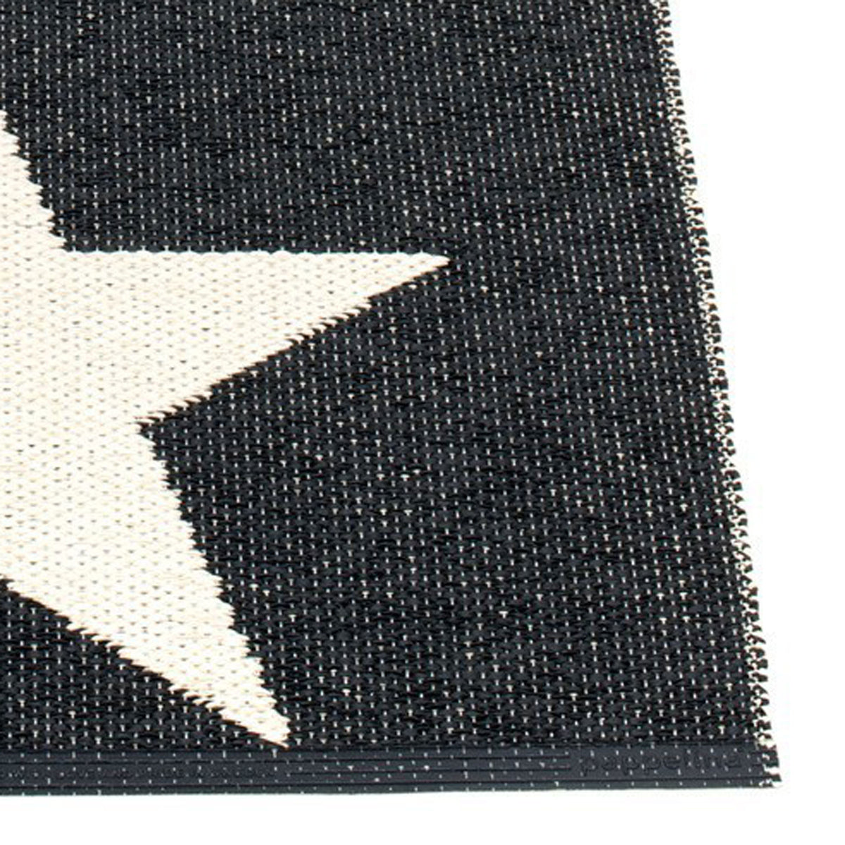 Viggo One Black & Vanilla Runner Rug by Pappelina, showing closeup view of viggo one black & vanilla runner rug.