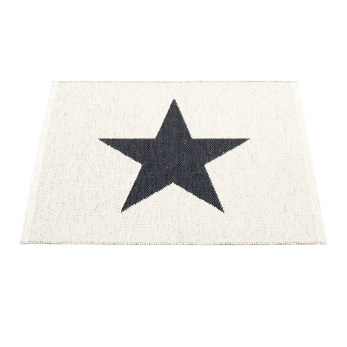 Viggo Small One Rug by Pappelina, showing back view of viggo small one black & vanilla rug.