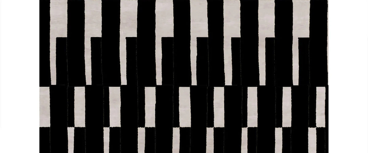 Villaputzo VO100 Rug by Second Studio, showing closeup view of villaputzo vo100 rug by second studio in black & cream.