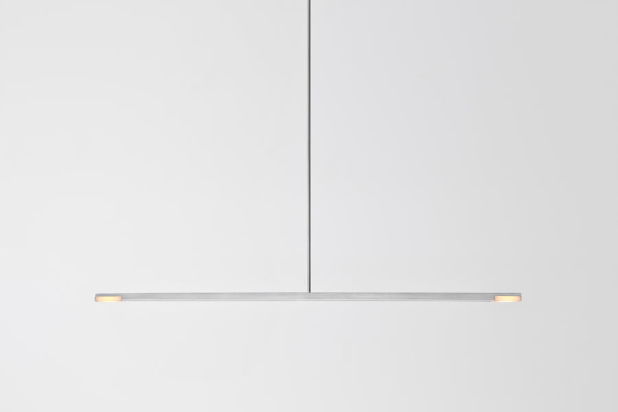 Virga LED Linear Pendant by Cerno, showing front view of virga brushed aluminum led linear pendant in live shot.