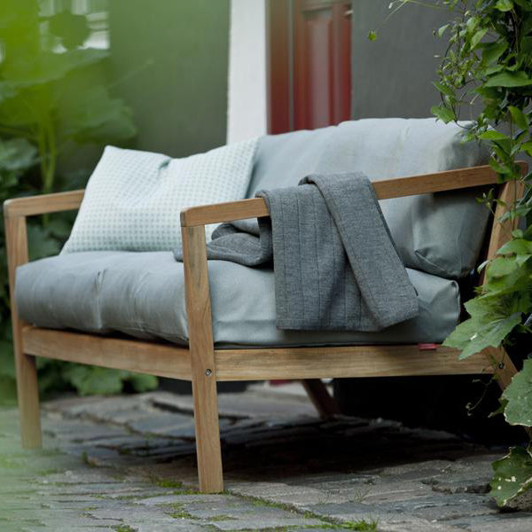 Virkelyst 2-Seater Sofa by Skagerak, showing virkelyst sofa in live shot.