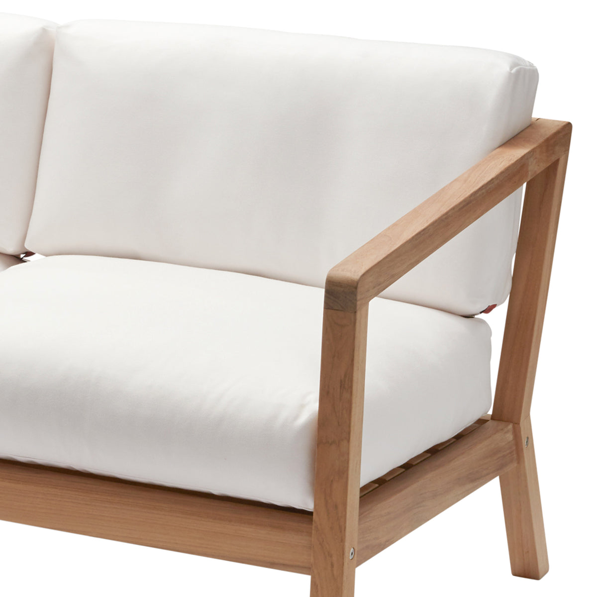 Virkelyst 3-Seater Sofa by Skagerak, showing closeup view of virkelyst 3-seater sofa in white textile cushion/teak.