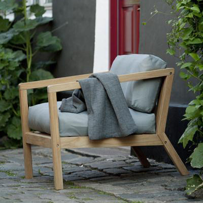 Virkelyst Chair by Skagerak, showing virkelyst chair in live shot.