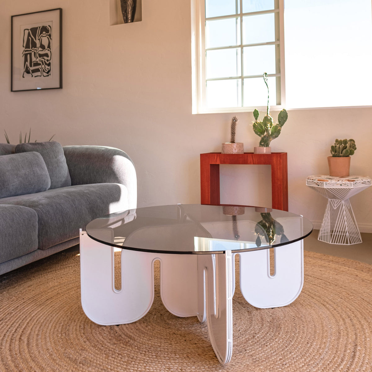 Wave Table by Bend, showing wave table with sofa, stool & table in live shot.