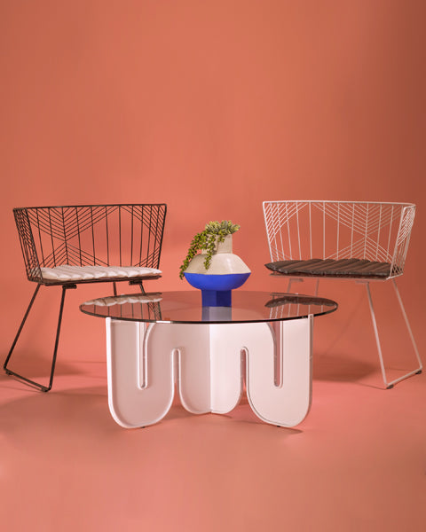 Wave Table by Bend, showing wave table with chairs in live shot.