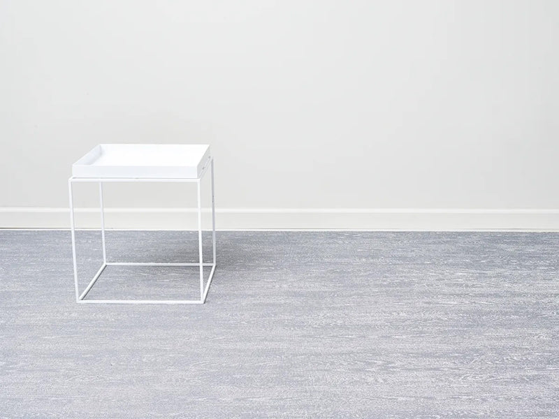 Woodgrain Woven Floor Mat by Chilewich, showing woodgrain woven floor mat in live shot.