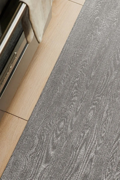Woodgrain Woven Floor Mat by Chilewich, showing woodgrain woven floor mat in live shot.