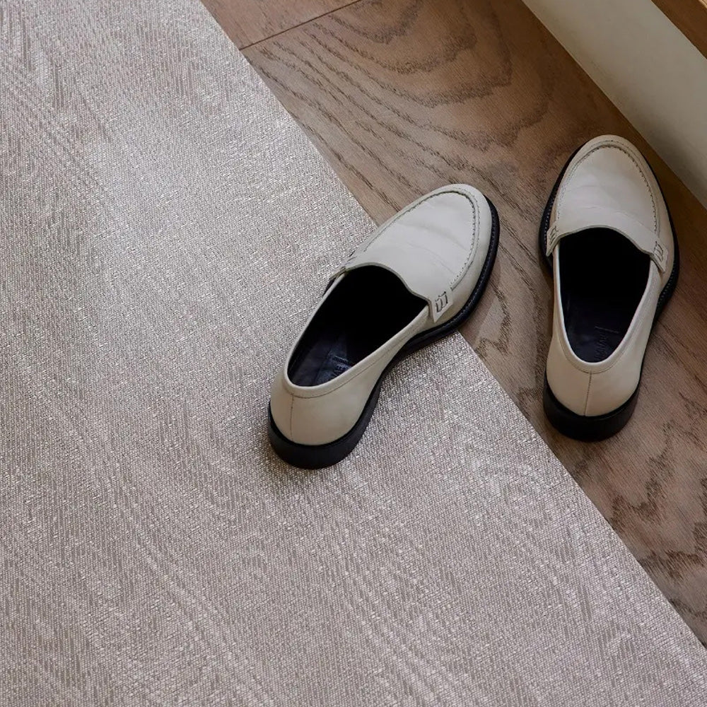 Woodgrain Woven Floor Mat by Chilewich, showing woodgrain woven floor mat in live shot.
