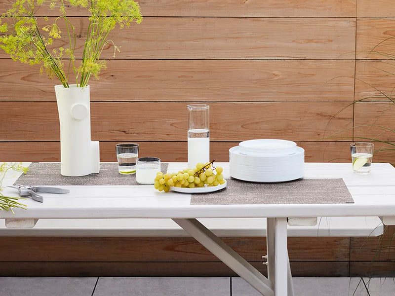 Woodgrain Placemat by Chilewich, showing woodgrain placemat in live shot.