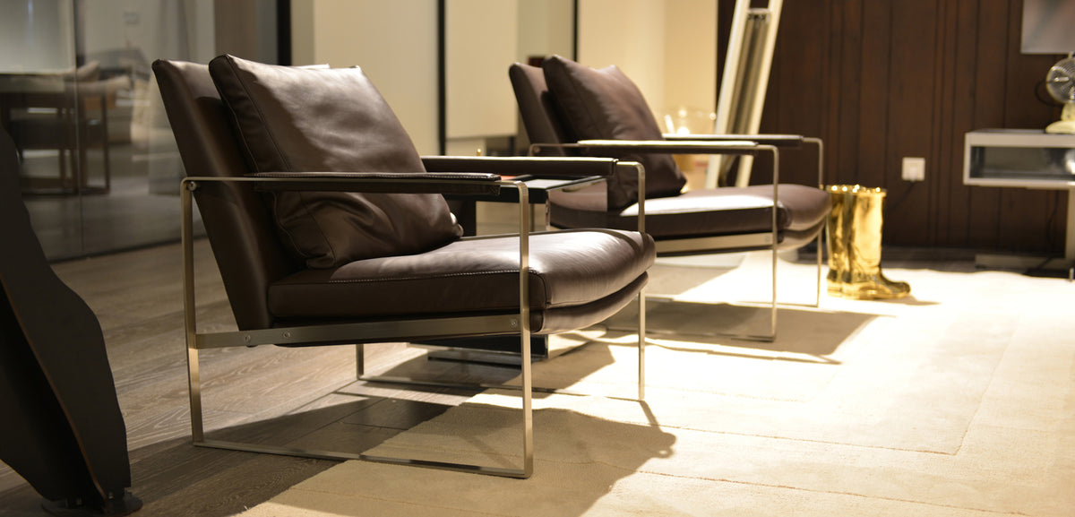 Zara Arm Chair by SohoConcept, showing zara arm chairs in live shot.