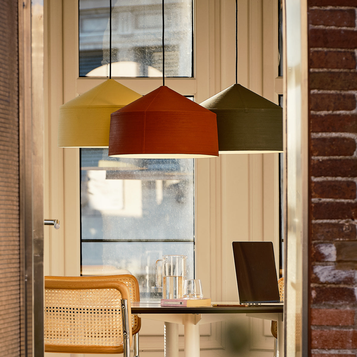 Zenc Pendant by Marset, showing zenc pendants in live shot.
