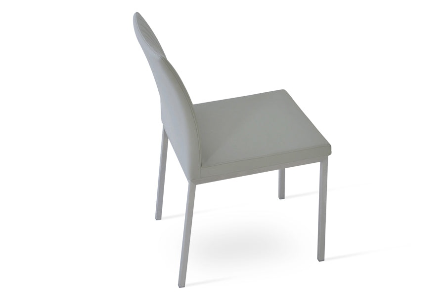 Zeyno Metal Dining Chair by SohoConcept, showing angle view of metal dining chair.