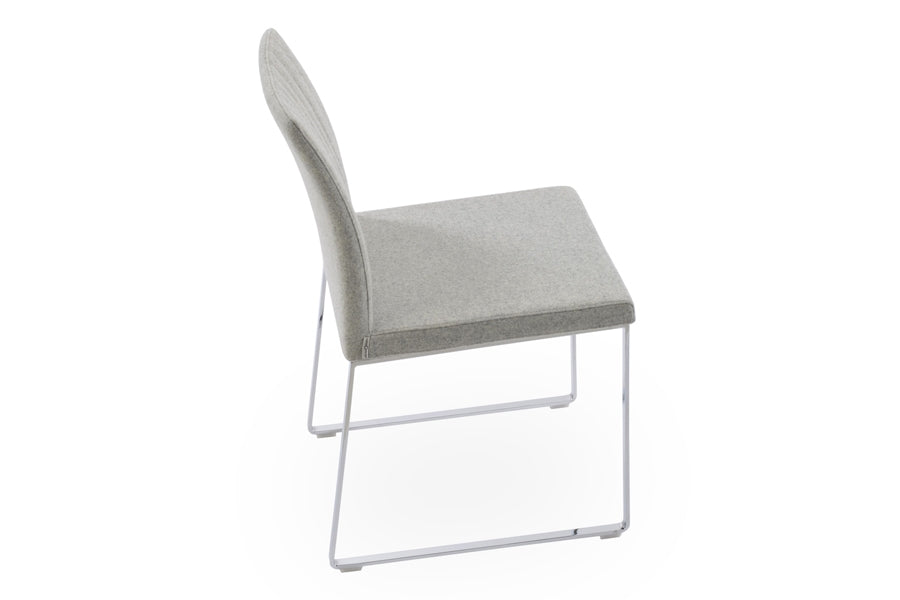 Zeyno Sled Chair by sohoConcept, showing angle view in camira blazer silver wool.