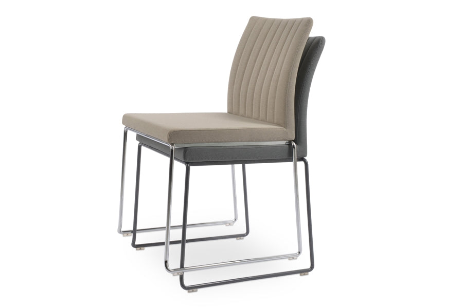 Zeyno Wire Stackable Chair by sohoConcept, showing two chairs in camira era beige wool with chrome base and camira blazer medium grey wool with black powder base.